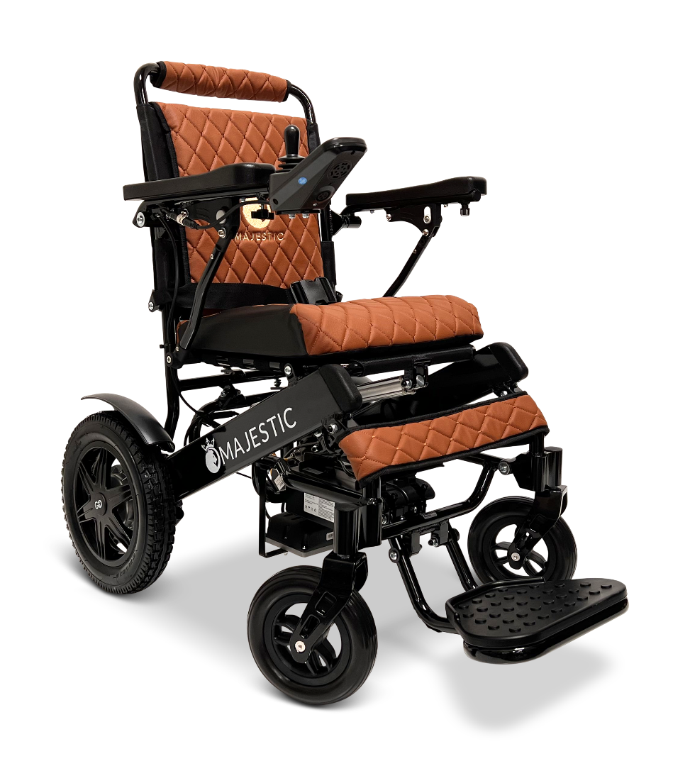 The ComfyGo MAJESTIC IQ-9000 Auto Reclining Electric Wheelchair features quilted brown and black cushioning, adjustable armrests, a digital joystick controller, large rear wheels, and an aircraft-grade aluminum alloy frame.